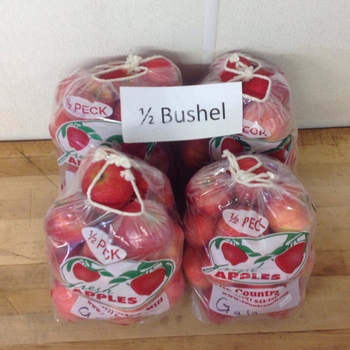 Bushel apples baskets stock royalty filled red